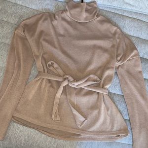 Tan turtleneck sweater from Fashion Nova